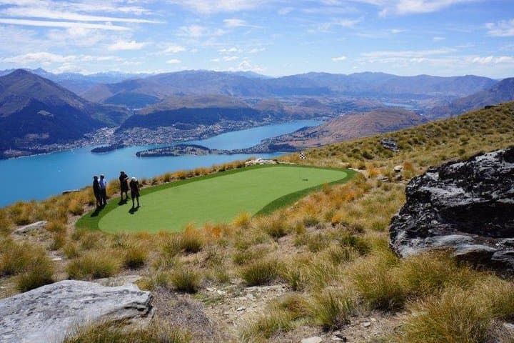 Clients putt out on the Over The Top Golf Green