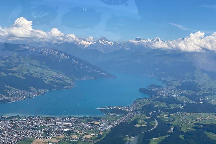 Lake Thun in the foreground with the Swiss Alps in the background
The view over Lake Thun to Interlaken and the high mountains