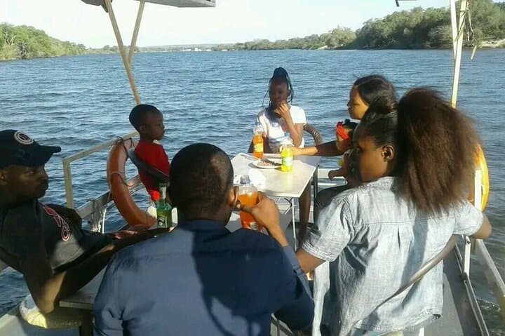 Victoria Falls Tour with Helicopter Flight and Sunset Cruise