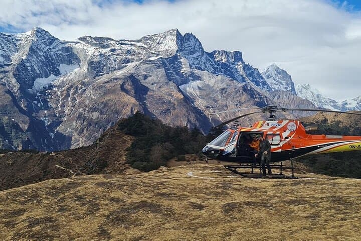 Helicopter landing at Everest View Hotel for a panoramic view of the Himalayan range, including Everest, Lhotse, and more.