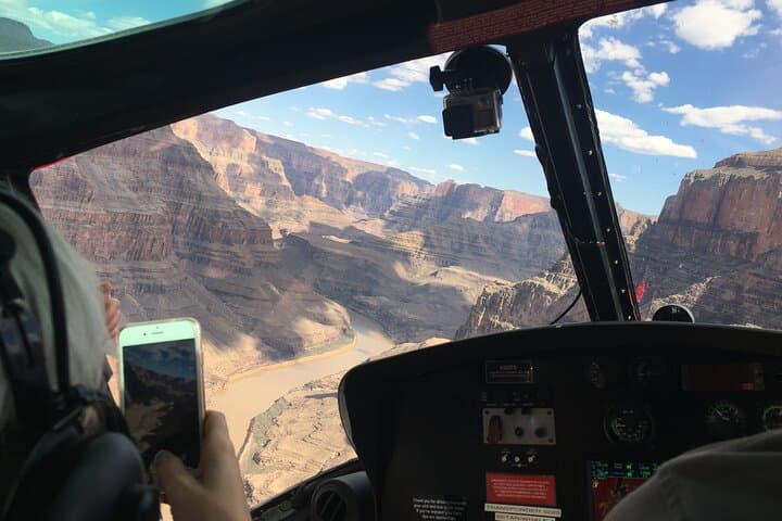Soar through the Grand Canyon as you fly over the Colorado River below the Rim
